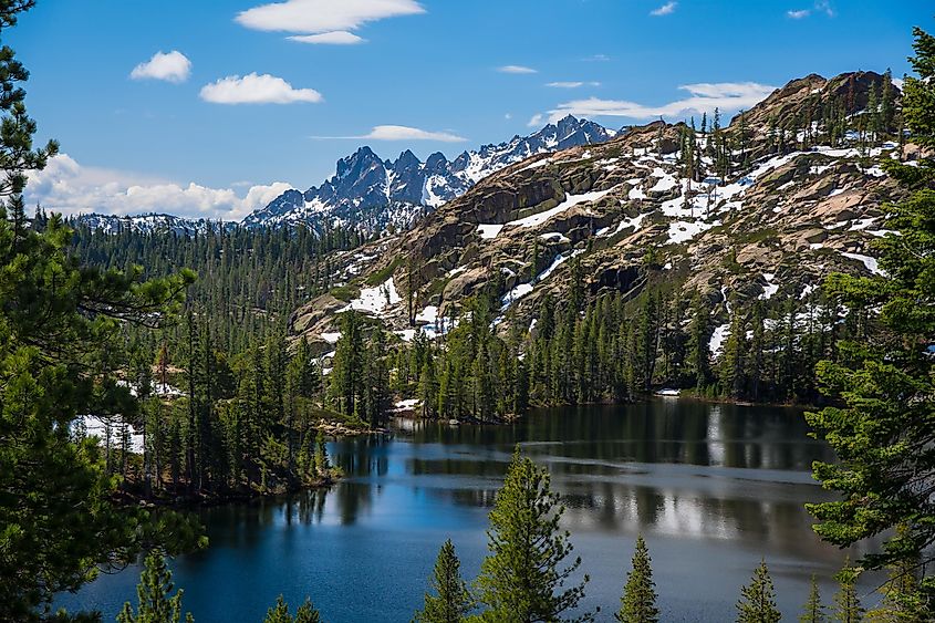 Sierra City, California: A beautiful landscape scene featuring the dramatic Sierra Butte mountains and a serene lake, capturing the natural beauty of this area.
