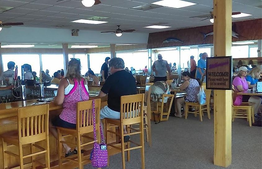 People eating inside Wilkerson's Seafood Restaurant, via