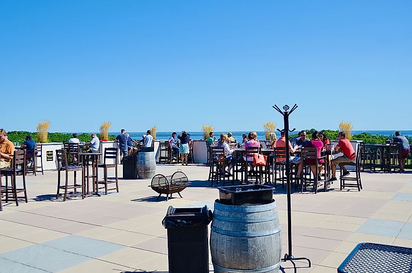 People enjoying the wine tastings and relaxing atmosphere at the Chateau Chantal Winery in Traverse City.