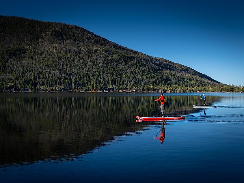 Paddle boarding in an empty Grand Lake due to the pandemic, during memorial weekend