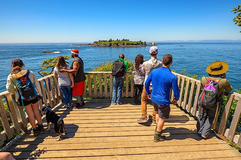 Cape Flattery, Washington, USA - June 11, 2023 : Tourists at Cape Flattery Observation Deck. Cape Flattery is the northwesternmost point of the contiguous United States.
