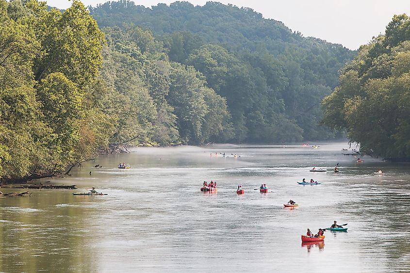 People raft, kayak and canoe down the Chattahoochee River on a hot summer day