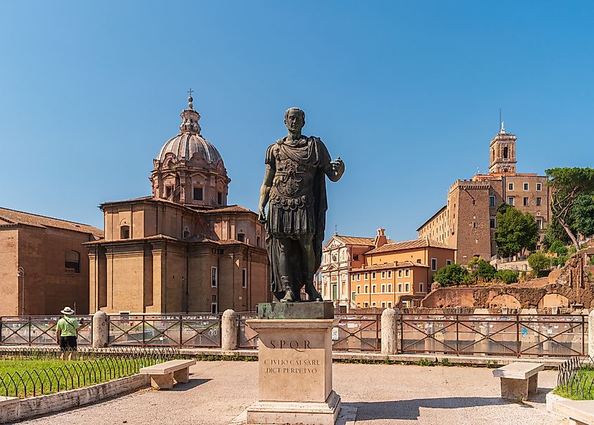 Statue of Julius Caesar with the Roman Forum in the background.