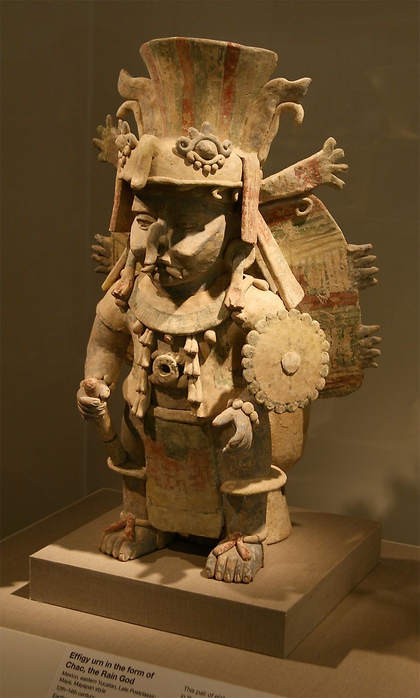 Terracotta sculpture of the Maya Rain God Chac at a museum.