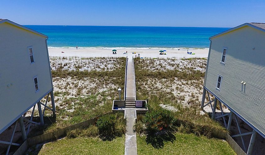 A beautiful view of a wooden path going to Henderson Beach State Park, Destin.