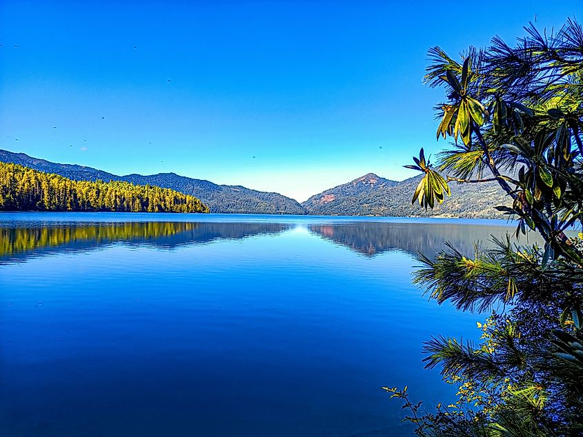 Beautiful view of Rara Lake which is situated in Nepal. Via Shutterstock / Saroj Magar.