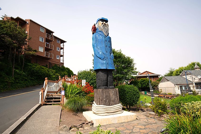 A statue of a ship captain in downtown Cannon Beach, Oregon
