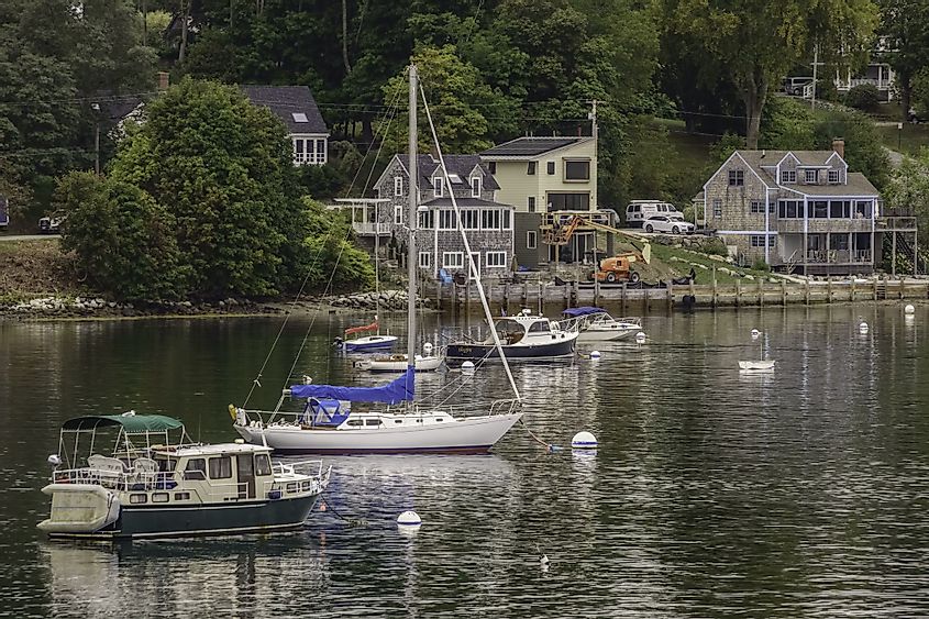 Motorboats and sailboats at anchor near the waterfront make for a peaceful scene at Castine, Maine.