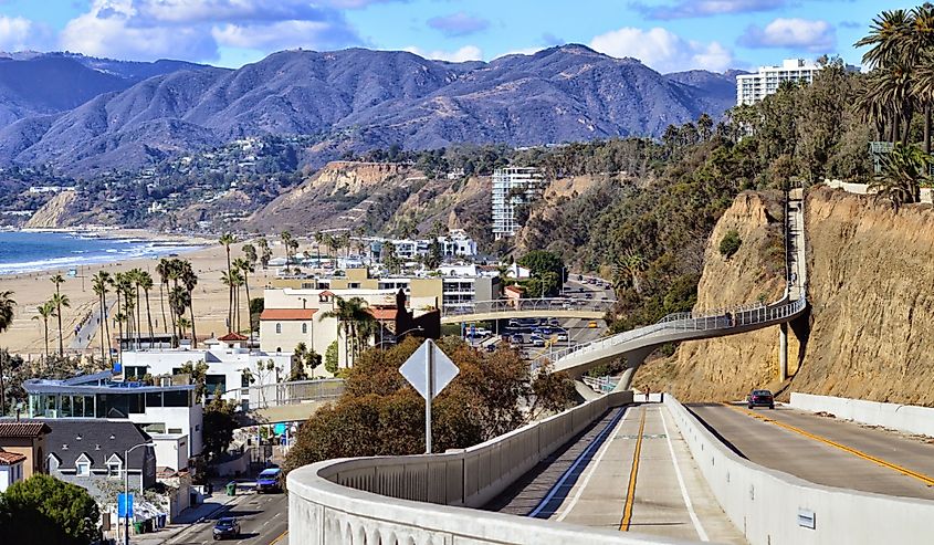 Beautiful scenery of the Santa Monica gulf and mountains over renewed Pacific Highway descent. California.