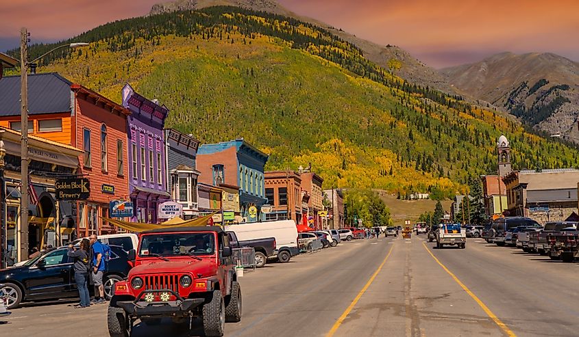 The main street of Silverton Colorado with mountains in the background
