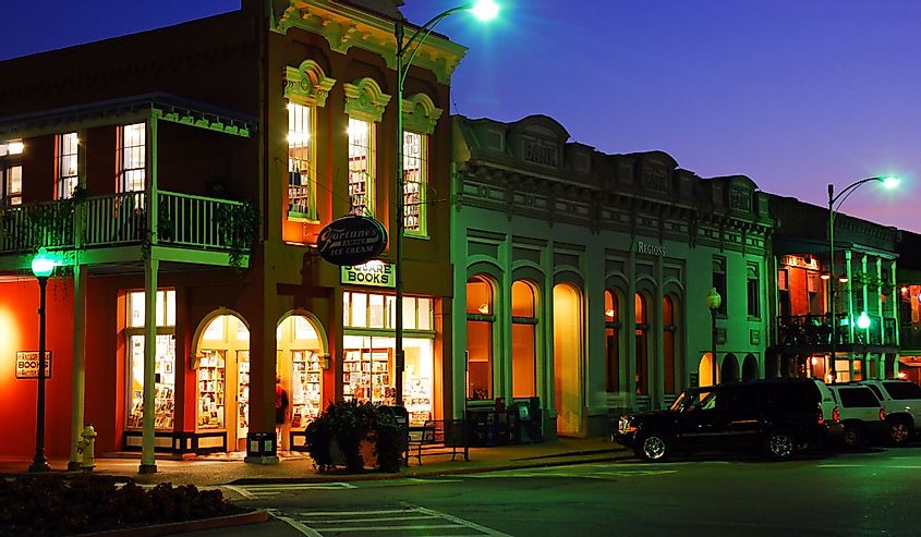 Square Books, a famed independent book store, glows against the dusk sky in Oxford, Mississippi