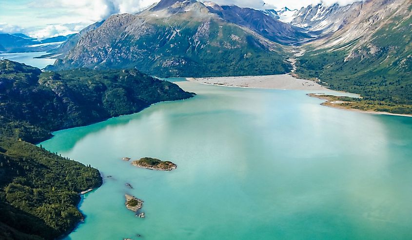 Aerial view of Glacier Bay National Park with water, mountains, ice. 