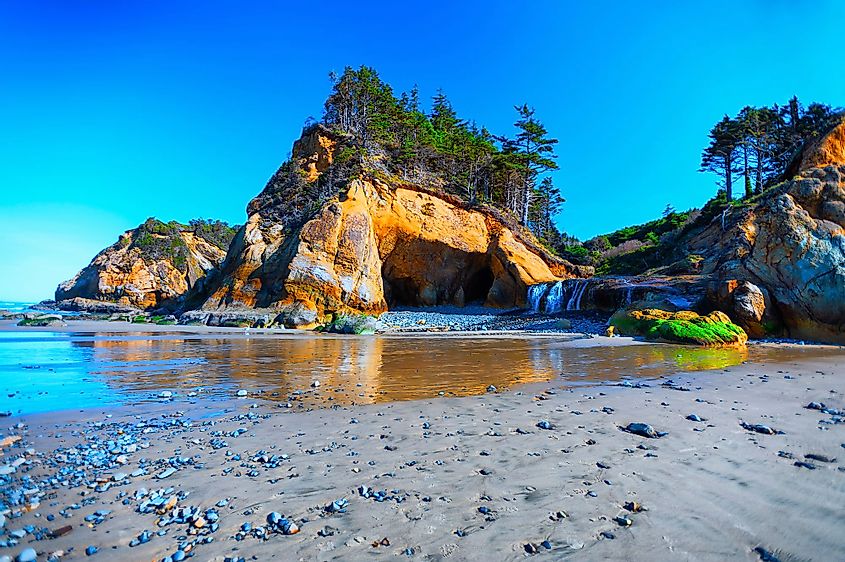Hug Point waterfalls visible and can be reached at low tide, near Cannon Beach, Oregon