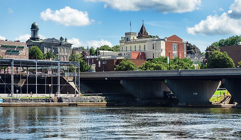 View from the riverwalk in downtown Oswego, New York on a summer afternoon