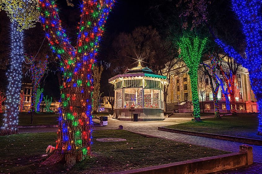 Downtown Prescott square with the Yavapai County Courthouse lit by annual Christmas decorations in Arizona