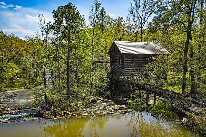 A historic mill in the wilderness near Opelika, Alabama. Image credit: JNix / Shutterstock.com.