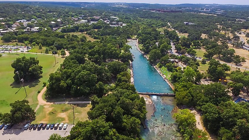 Aerial view of Barton Creek and Barton Springs Pool in Greenbelt area in Zilker Park
