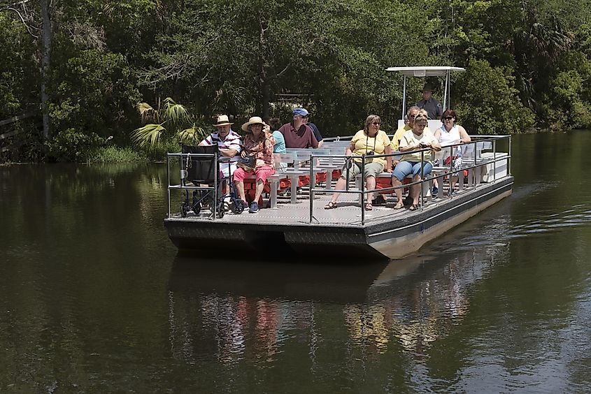 Tourists taking a boat ride in the Homosassa Springs Wildlife State Park in Florida 