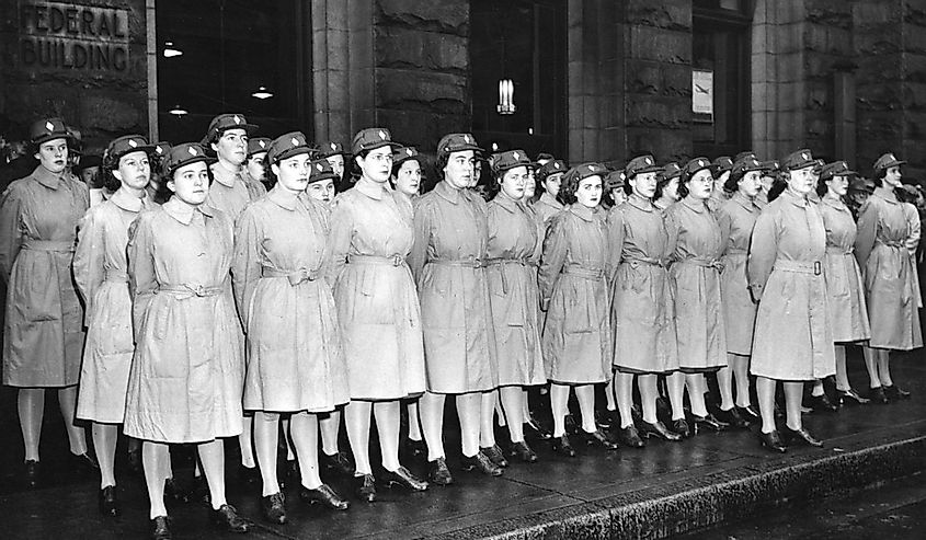 Canadian Women's Army Corps stand at attention in front of the Federal Building