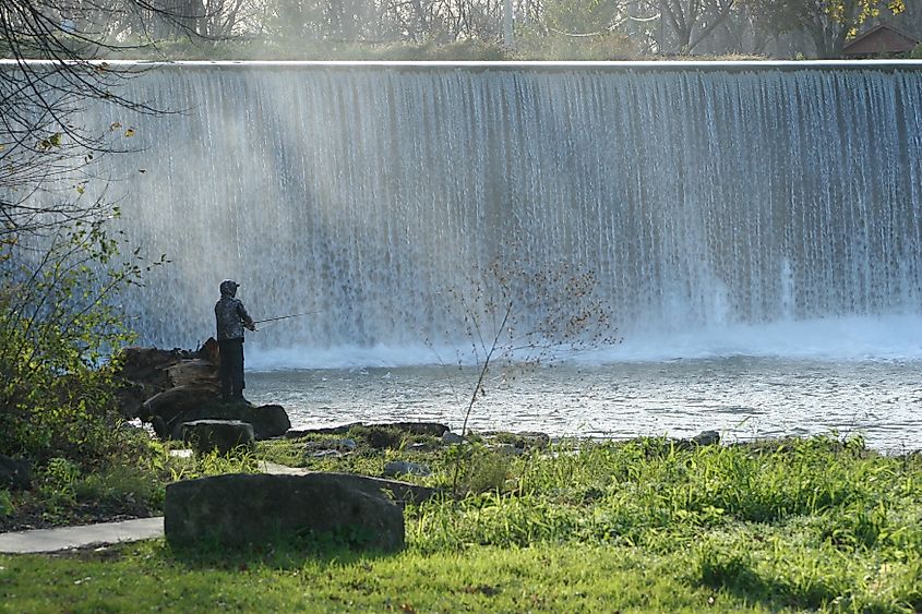 The Root River running over the dam in Lanesboro, Minnesota.