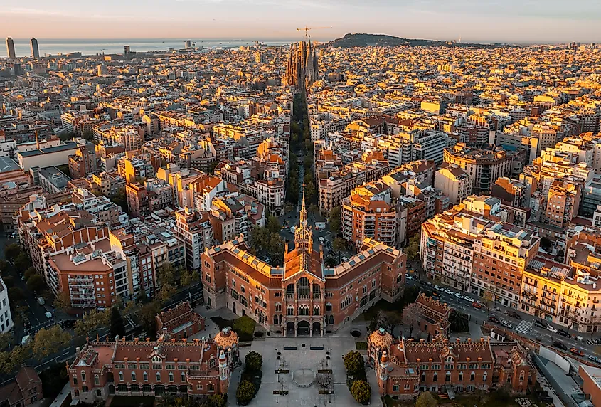 Barcelona skyline with Sagrada Familia Cathedral and Hospital of the Holy Cross and Saint Paul (de la Santa Creu i Sant Pau) at sunrise. Catalonia, Spain