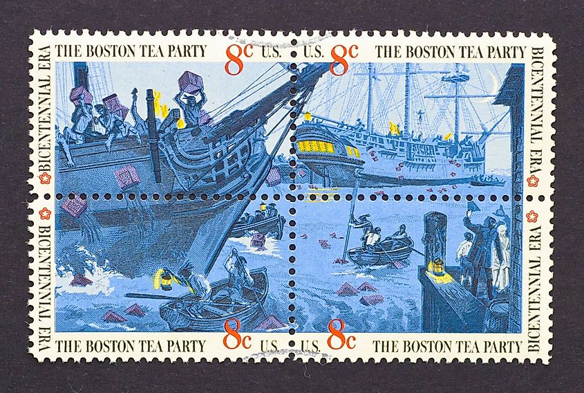 A set of four postage stamps printed in USA showing a scene of The Boston Tea Party, circa 1973