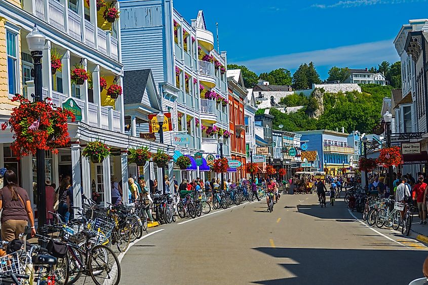 Crowded street view of Mackinac Island Michigan during the busy tourist season. Editorial credit: Dennis MacDonald / Shutterstock.com