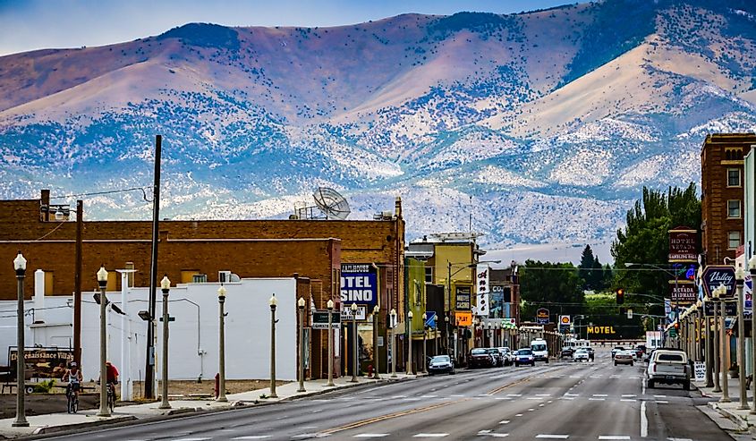 View of the main street in Ely, Nevada, with a mountain