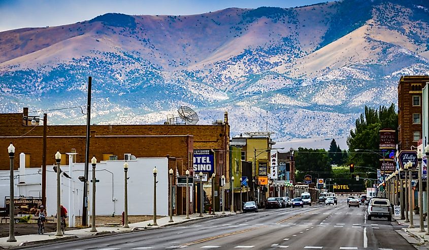 Route 50, the main street in western town of Ely, Nevada is seen against backdrop of mountain range.