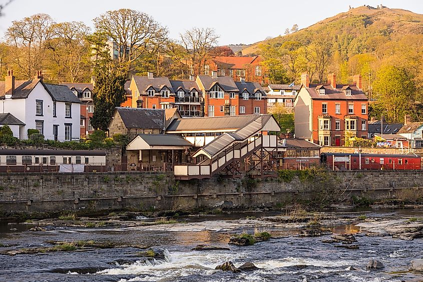 Llangollen, Denbighshire, Wales: View of the Llangollen town. Brick houses on the River Dee.