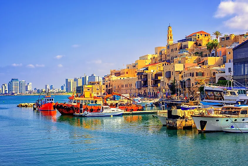 Old town and port of Jaffa and modern skyline of Tel Aviv city, Israel