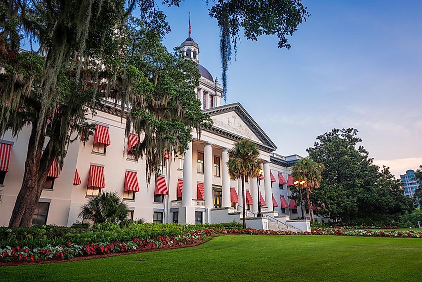 Tallahassee, Florida, USA with the Old and New Capitol Building at twilight