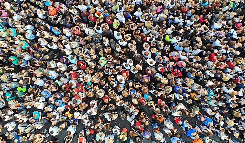 Aerial view of mass gathering of many people in one place.