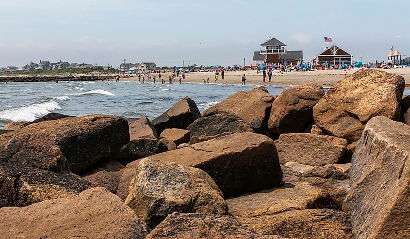 View of Roger Wheeler State Beach taken from behind a large rock Hetty in Narragansett Rhode Island.