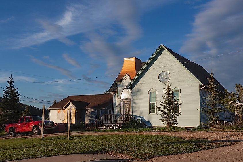 A former church turned into a home in Sundance, Wyoming, via Logan Bush / Shutterstock.com