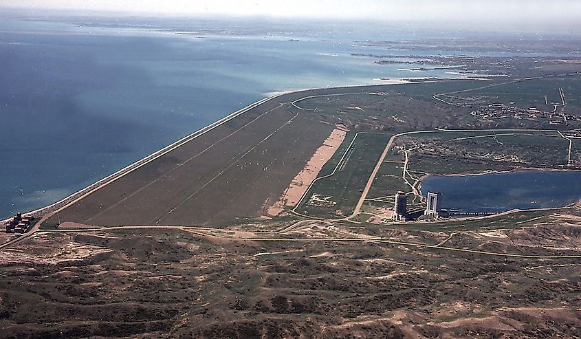  Aerial view of Fort Peck Dam, showing both powerhouses and dam. Missouri River, Fort Peck, Montana.