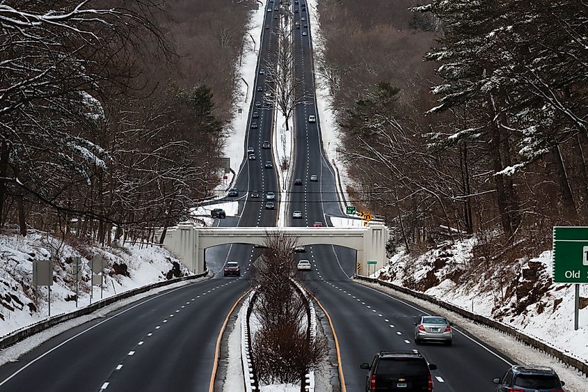 New Canaan, CT, USA - March, 03, 2019: Daytime traffic on the Merritt interstate highway during the winter season.