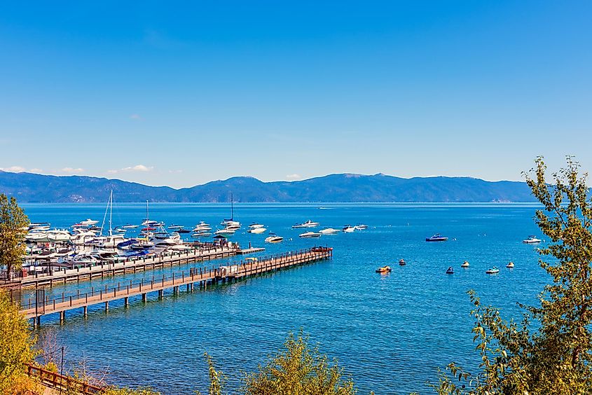 Marina in Tahoe City, California, USA on summer day in september. The state of Nevada is visible across the water.