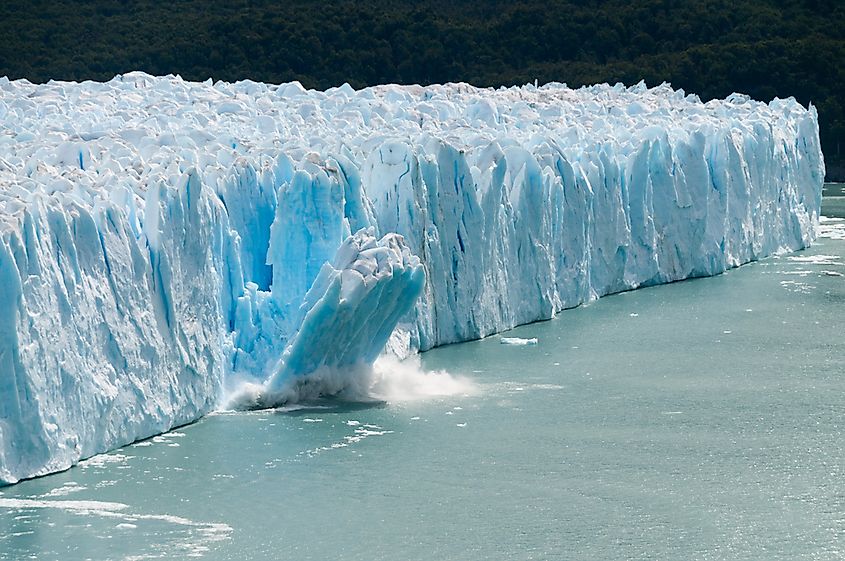 Ice calving off the front of a glacier.