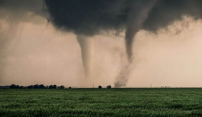 A pair of tornadoes take a destructive path through northern Oklahoma farmyards near Cherokee