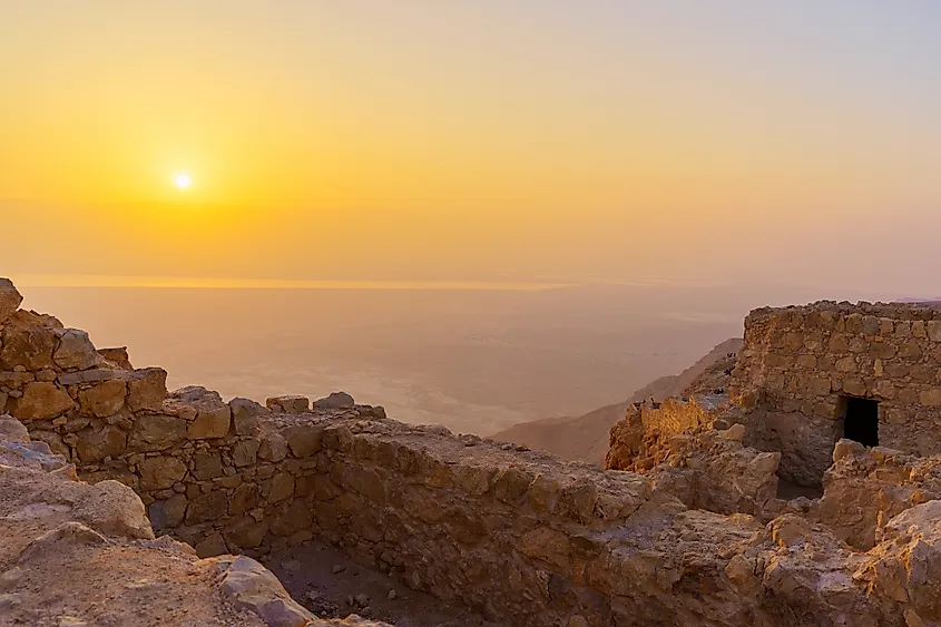 Sunrise view of the ruins of the Masada Fortress and the Dead Sea, Judaean Desert, southern Israel (Credit: RnDmS via Shutterstock)