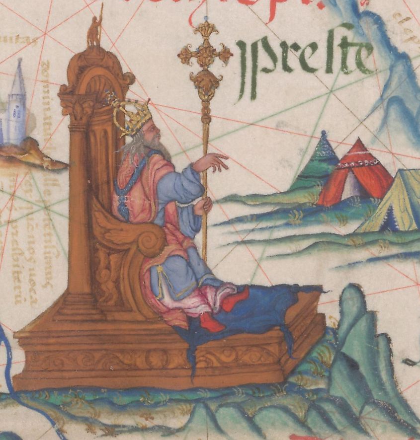 "Preste" as the Emperor of Ethiopia, enthroned on a map of East Africa. From an atlas by the Portuguese cartographer Diogo Homem for Queen Mary, c. 1555–1559.