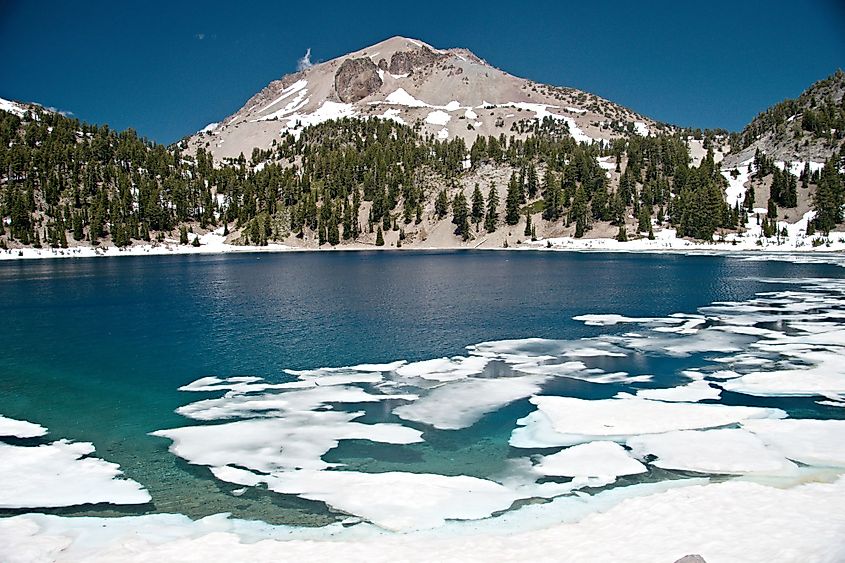 Lassen Peak with snow as viewed from Manzanita Lake