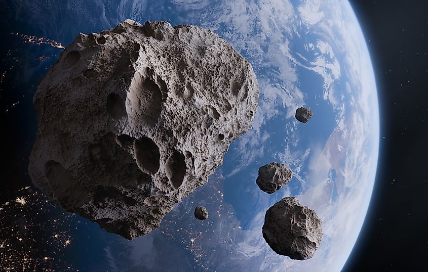 Earth in the background of a large asteroid