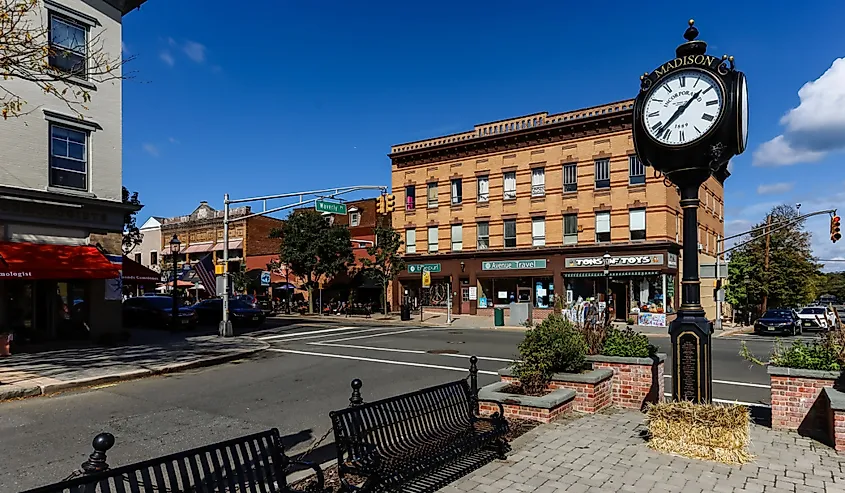 A huge clock in the main street of Madison, New Jersey downtown on a sunny afternoon