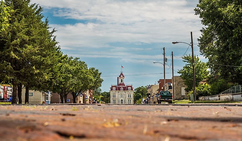 Horizontal photo of the old downtown area of Cottonwood Falls, Kansas with the courthouse at the end of the street