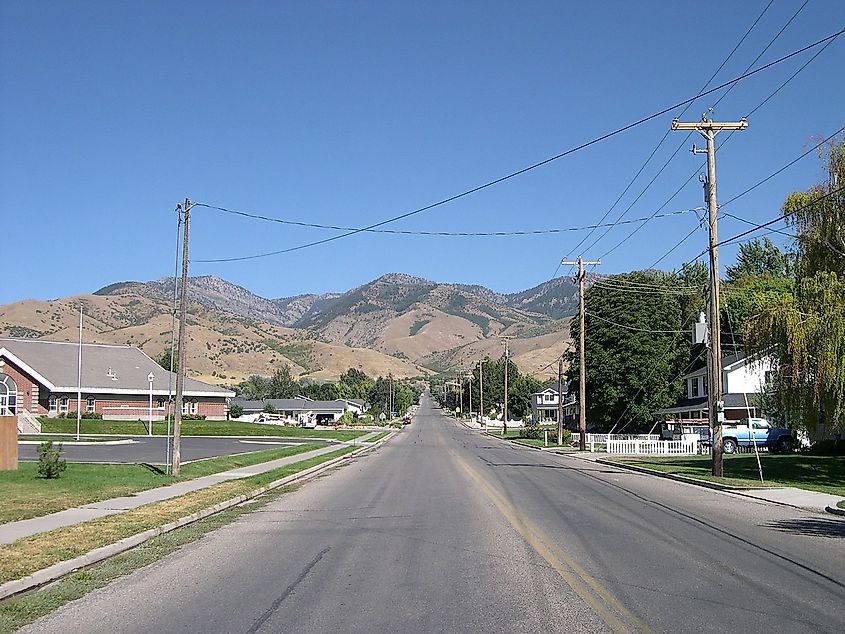 Street in Smithfield, Utah in the summer with mountain views.