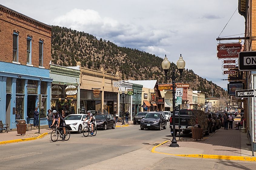 Bicycles and cars on the Main Street of Idaho Springs, Colorado.
