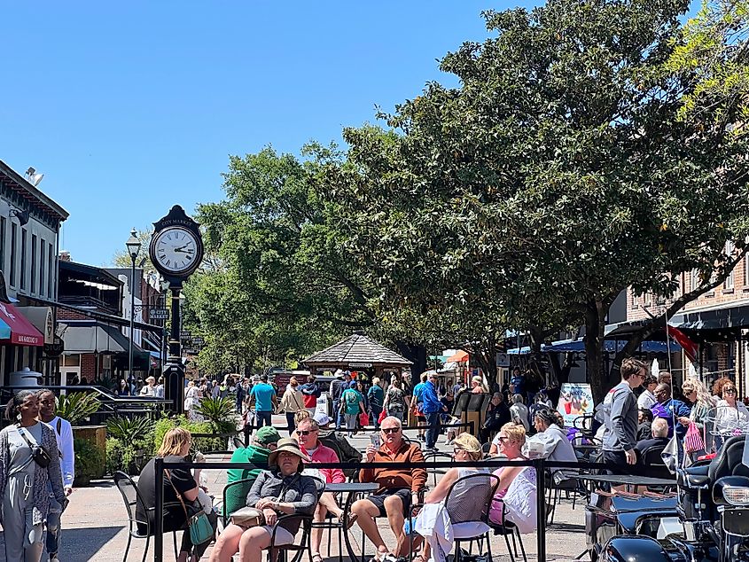 A crowd of people at City Market, a popular tourism destination in the historic district.