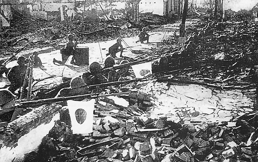Japanese troops in the ruins of Shanghai.